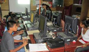 Kids working on computers in a lab.