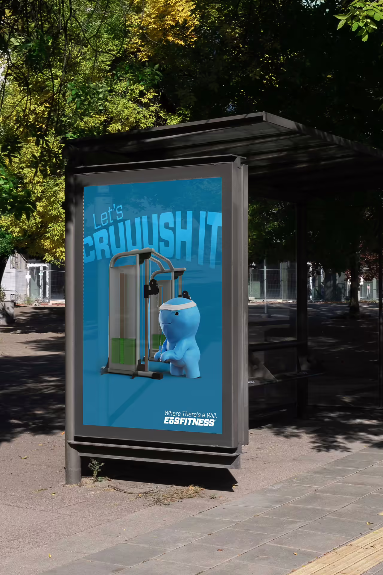 A modern covered transit stop displaying an EOS Campaign poster in an frame, next to a roadway during the day.